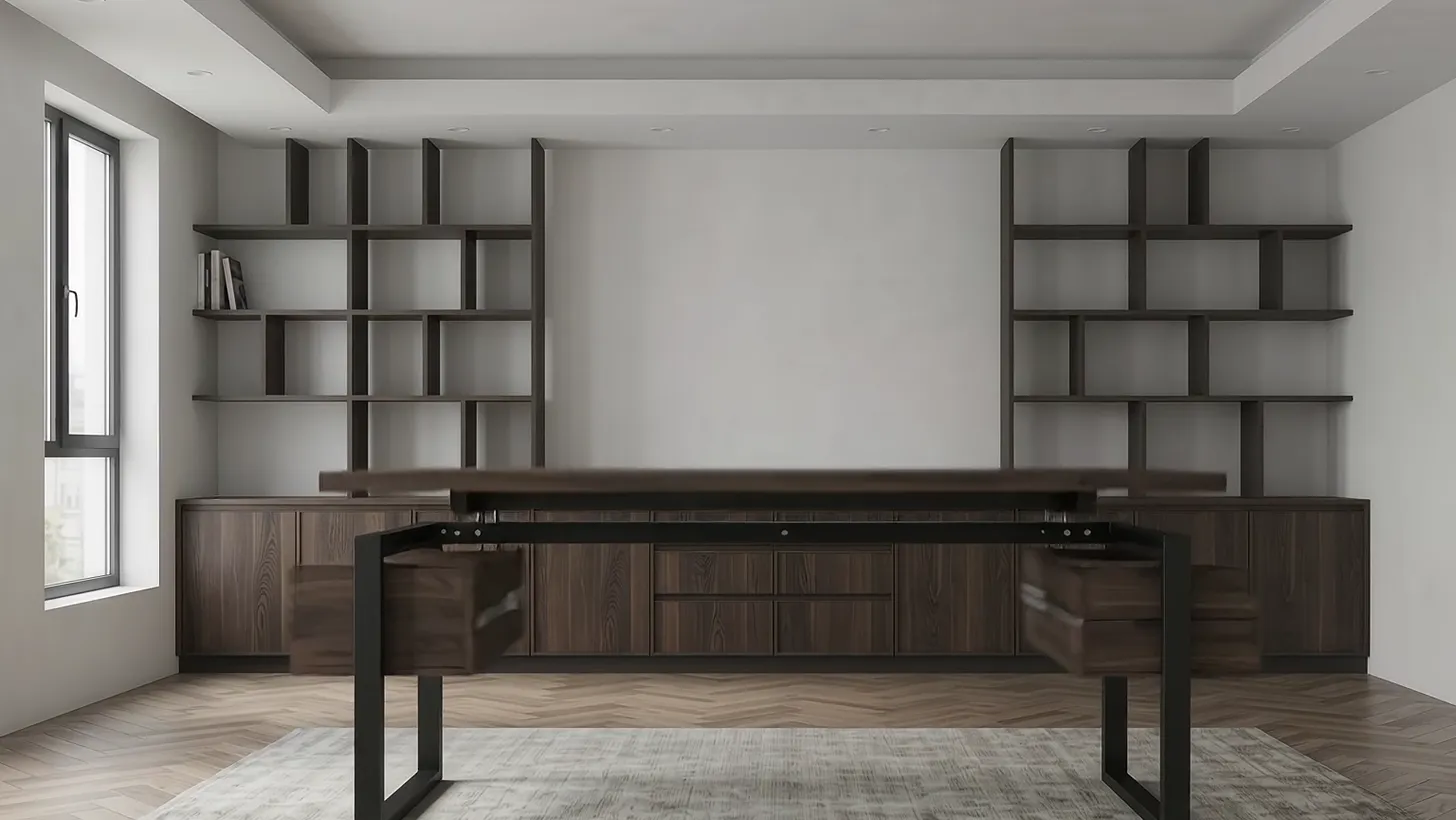 A long walnut desk top being lowered onto blackened steel legs